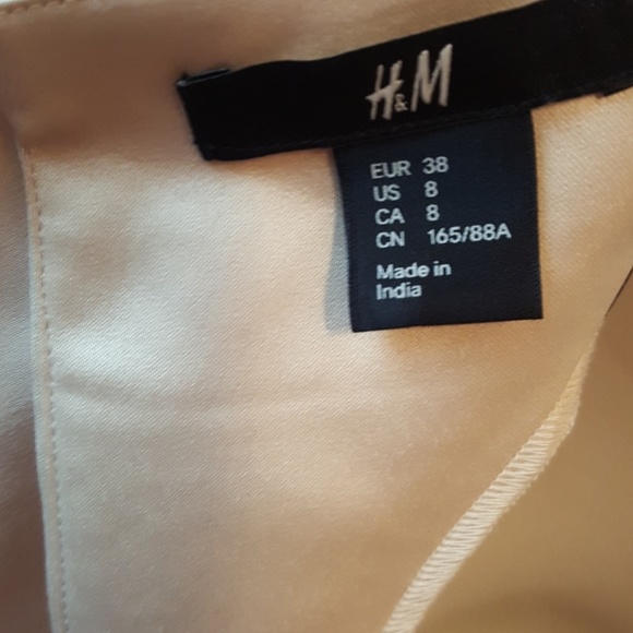 Dress  beige with black trim. Looks like silk. - Picture 3 of 4